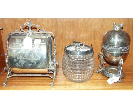 A silver plated eggolier, the cover with hen finial enclosing a four-egg stand on phoenix scroll legs with burner stand, 24cm