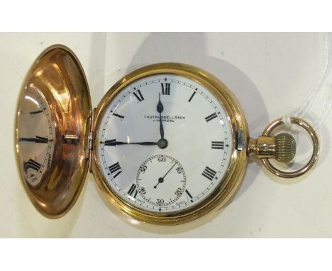 Thomas Russell & Son, Liverpool, a 9ct gold hunter cased keyless pocket watch, the white enamel dial with Roman numerals and 