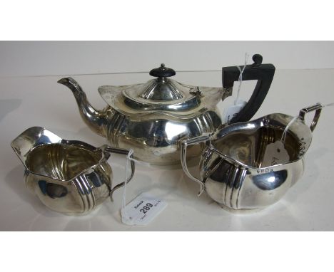 An oval bachelors silver three piece tea service of plain bellied form, Birmingham 1912___15oz.