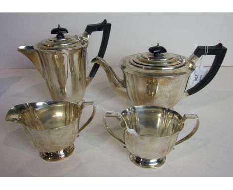 A four-piece oval ribbed silver tea service, Birmingham 1940 ___51oz.