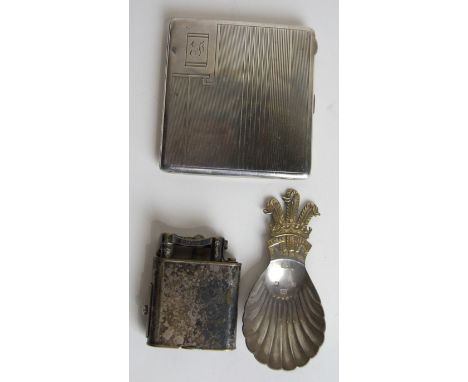 A silver plate Dunhill cigarette lighter, a silver cigarette case, Birmingham 1940 and a modern caddy spoon with Prince of Wa