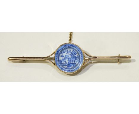 An unusual bar brooch inset blue and white willow pattern circular miniature enamelled plate, reg mark for 1876, (originally 