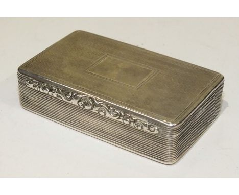 A William IV silver snuff box by Edward Smith of rectangular form with engine turned lid and base, reeded sides and floral th