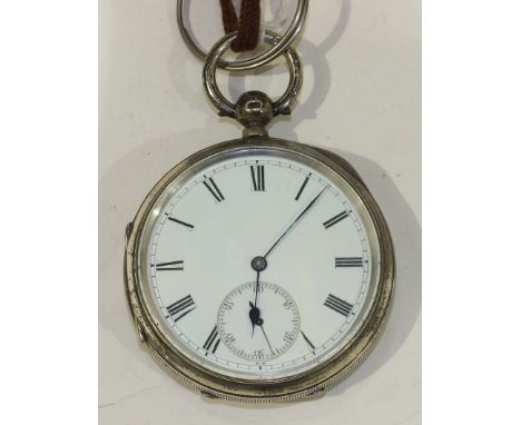 A Victorian open face keywind pocket watch, the white enamel dial with Roman numerals and seconds subsidiary, in engine turne