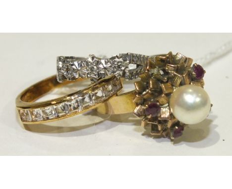 A gold ring set pearl and ruby cluster, (one ruby setting vacant), in unmarked mount, (tests as 9ct), size N and two other 9c