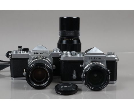 Two Nikon SLR Cameras, a Nikon F, serial no 7076310, with eye level finder, shutter working, self timer working, body G, lens