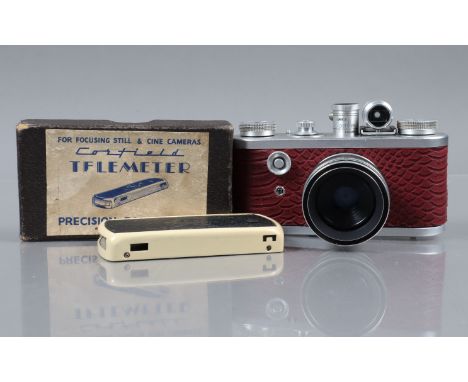 A Corfield Periflex 1 Camera, silver, re covered with faux red reptile effect leatherette, shutter working, with Lumax 45mm f