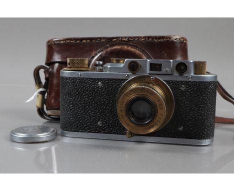 A Soviet Leica Camera Replica, a FED I, FED markings to top plate, crude Leica II replica, chrome with brass lens &amp; dials