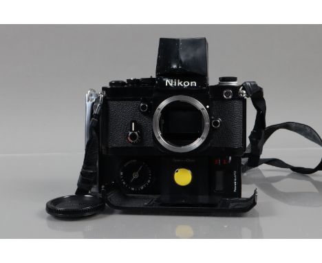 A Nikon F2 SLR Camera, black, serial no 7396260, shutter working, self timer working, with DA-1 action finder, finder loose t