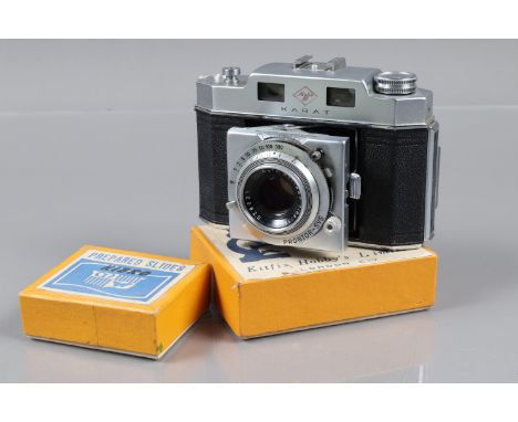 An Agfa Karat IV 35mm Folding Rangefinder Camera, shutter sluggish on slow speeds, rangefinder functions, body G, with 50mm f