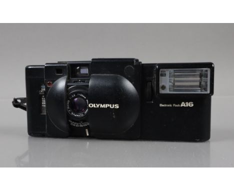 An Olympus XA Compact Camera, shutter working, rangefinder functions, self timer working, body G, elements G, with untested A