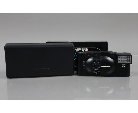 An Olympus XA 2 Compact Camera, shutter working, self timer working, body G-VG, with A11 flash, flash working, in case, with 