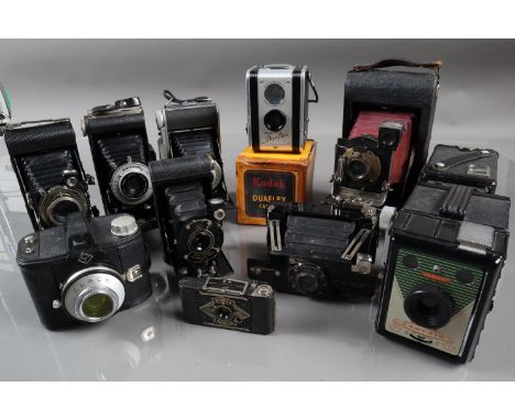 A Tray of Folding and Box Cameras, including an Ensign Midget, a No 2 Ensignette De Luxe, a Kodak Vest Pocket Autographic Mod