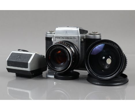 A Pentacon Six TL Camera, shutter working, self timer working, body G, with Carl Zeiss Jena 80mm f/2.8 MC Biometer lens, barr