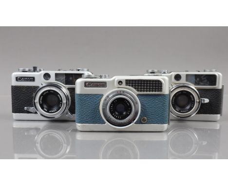 Three Canon Demi 35mm Half Frame Cameras. a Canon Demi, blue, shutter working, meter responsive, body F-G, elements G, a Demi