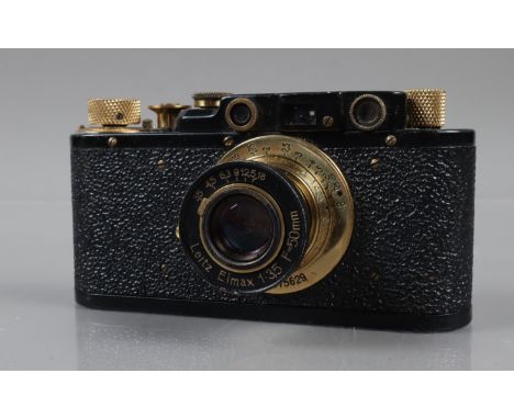 A Soviet Leica Camera Replica, a FED I, crude Leica II D replica, black with brass lens &amp; dials, serial no 357083, shutte