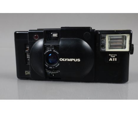 An Olympus XA4 Macro Compact Camera,  shutter working, self timer working, body G, elements G, with untested A11 flash 