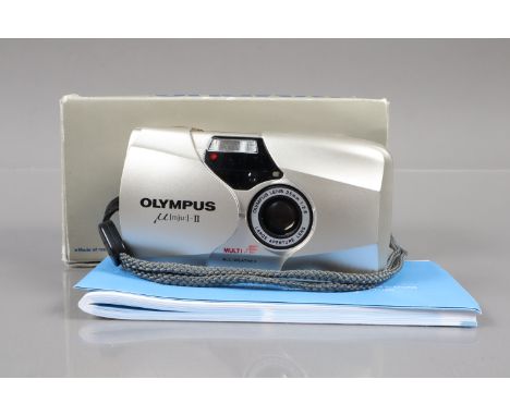 An Olympus mju II Compact Camera, silver, powers up, shutter working, flash working, self timer working, body G-VG, elements 