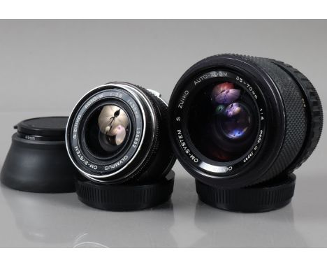 Two Olympus OM lenses, a G Zuiko 35mm f/2.8 lens, barrel G, elements G, with rear cap &amp; lens hood and a S Zuiko 35-70mm f