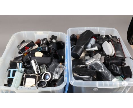 Two Boxes of Camera Related Accessories, including, flash units, filters, hoods, caps, light meters, converters, tubes and ot