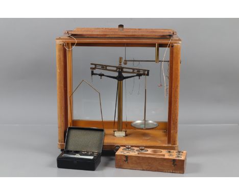 A Set of J W Towers &amp; Co Laboratory Scales, in case, with  two sets of brass weights, one missing 80 &amp; 100 gram weigh