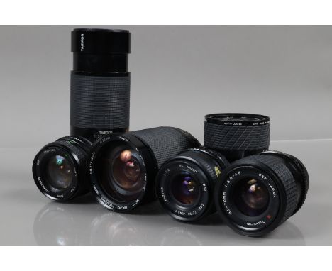 A Group of OM Mount Lenses, a Carl Zeiss Jena II MC macro 24mm f/2.8 lens, an Ensinor MC 24mm f/2.8 lens, a Tokina 35-70mm f/