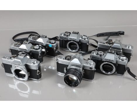 A Tray of Minolta SLR Camera Bodies,  two SRT 101, shutters fire, bodies G, a SR-7, shutter fires, body G, with Rokkor 55mm f