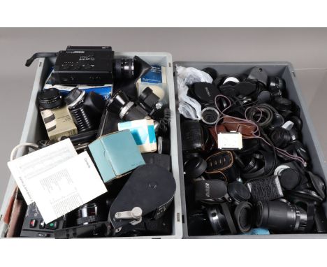 Two Boxes of Camera Related Items, including light meters, converters, tubes, hoods, caps, motor drives, filters camera manua