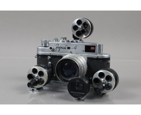 A Zorki 4 and Four Soviet Finders, a Zorki 4, shutter working, self timer working, body G, with Jupiter 50mm f/2 lens, elemen