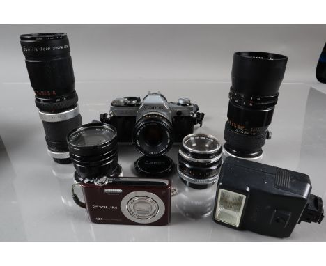 A Canon AE-1 SLR Camera, shutter working, meter responsive, self timer working, body F-G, some wear to base plate, would bene