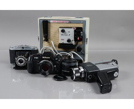 A Group of Photographic Items, including a Nikon F-501 SLR camera, signs of battery leakage in holder, untested, body g, WITH