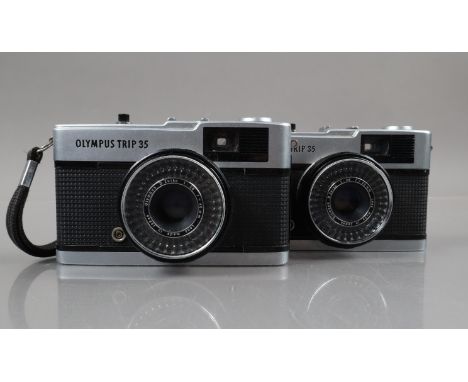 Two Olympus Trip 35 Compact Cameras, shutters working, light cells responsive, aperture responsive in auto setting, one body 