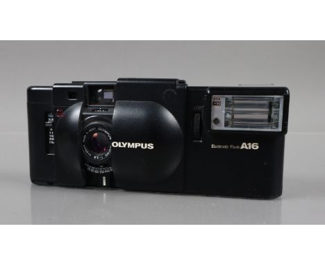 An Olympus XA Compact Camera, shutter working, rangefinder functions, self timer working, body G, elements G, with untested A