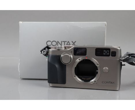 A Contax G2-D Camera Body, serial no 011068, powers up, shutter button fires, shutter not responding, meter/LED display respo