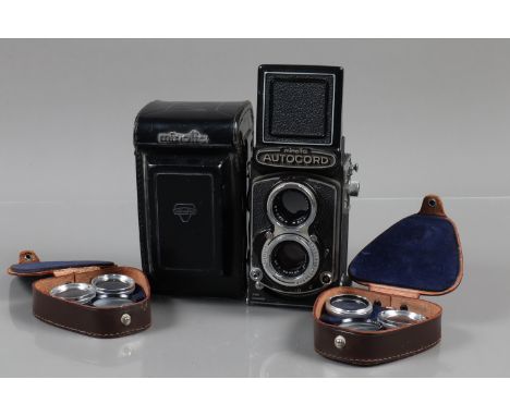 A Minolta Autocord TLR Camera, serial no 423588, Citizen 1/500 MVL shutter, shutter working, self timer working, body G, some