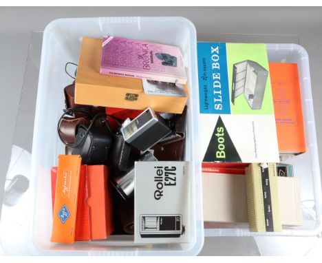 Two Boxes of Camera Related Items, including light meters, projection lenses, filters, hoods, caps, cases, slides, slide maga