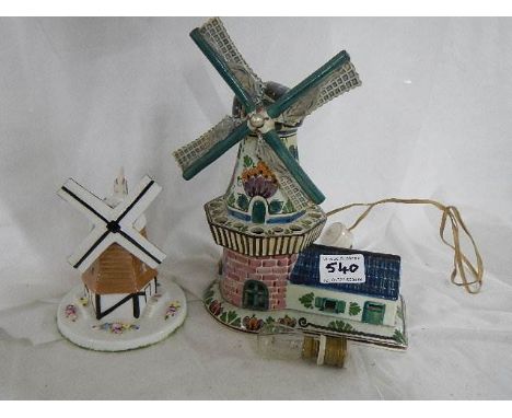 An old windmill lamp and another lamp.