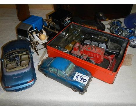 A mixed lot of model cars etc.,