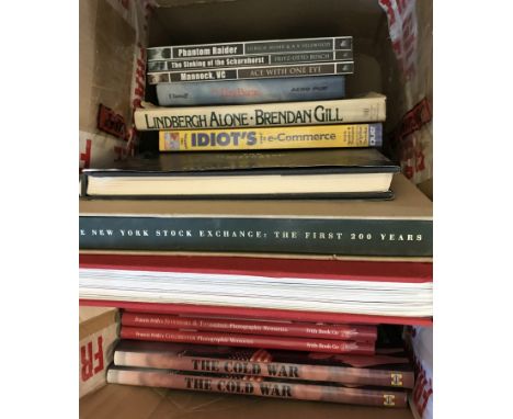 A box of books to include "The Cold War" by Haynes, "Botero Women" and "The New York Stock Exchange: The first 200 years." 