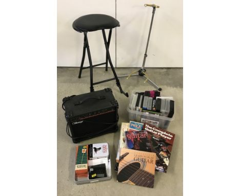 Vantage practice guitar amplifier. Together with a guitar stand, guitar stool/stand, tutorial DVD's, distortion pedal, tuner,