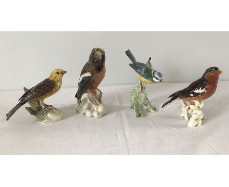 A collection of 4 ceramic Goebel birds to include Yellow Hammer and chaffinch.  