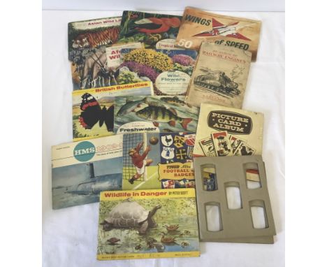 A collection of vintage Brooke Bond and Lyons tea card albums with cards. To include Tiger album of football club badges. 