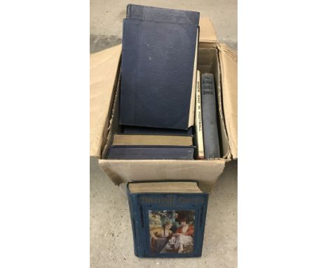 A box of vintage books to include a set of The Book of Knowledge. Together with The British Girls Annual and 1970 Clipper Ann