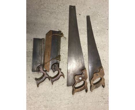 4 vintage wooden handled saws.  