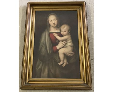 A vintage gilt framed print of Madonna and child. Framed and glazed. Image size 55 x 36cm