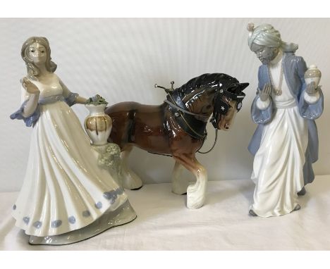 3 ceramic figurines. A Nao figure of a wise man A Nao figure of a Wise Man together with a shire horse and a Lladro style lad