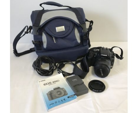 Canon EOS 400D digital camera. With instruction manual, 18-55mm Canon lens, charger and bag. 