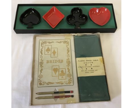 A vintage boxed bridge set together with a boxed set of Carlton Ware ceramic card suit dishes. Circa 1960's - 70's. 