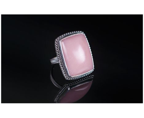 Pink Opal Cabochon Ring, a hand crafted ring with a 30ct solitaire cabochon pink opal, mined in Peru, bezel set in silver wit