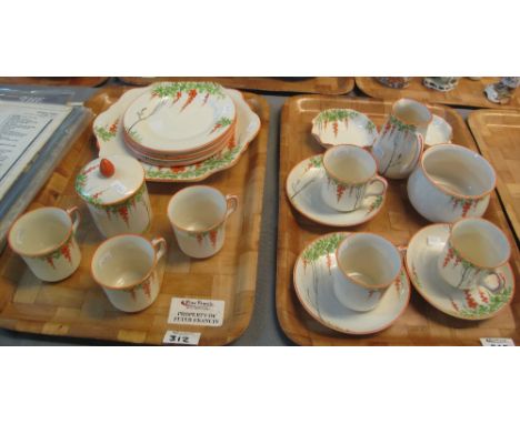 Two trays of WH Goss porcelain teaware on a white ground with enameled woodland decoration (2).(B.P. 24% incl. VAT)